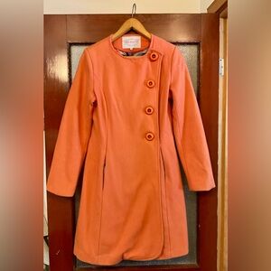 Orange Trench Coat with Unique Button Design